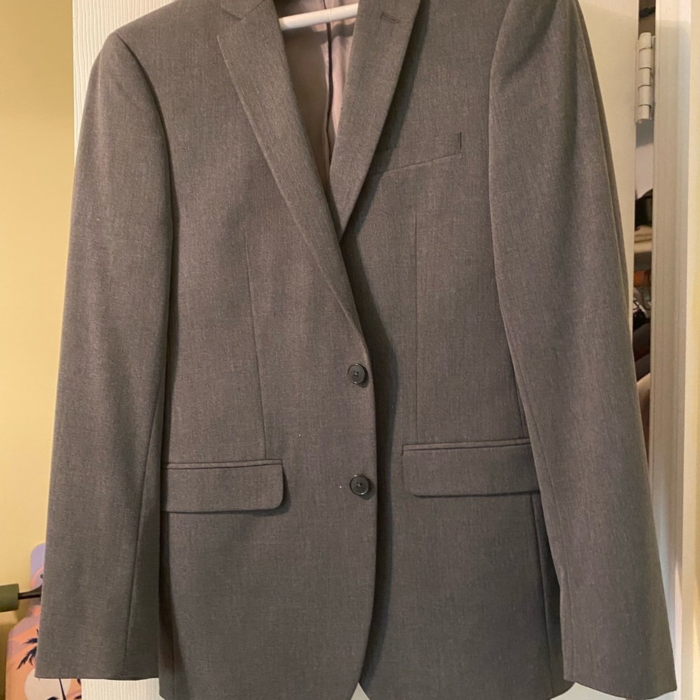 Grey suit jacket. Worn once and dry cleaned.